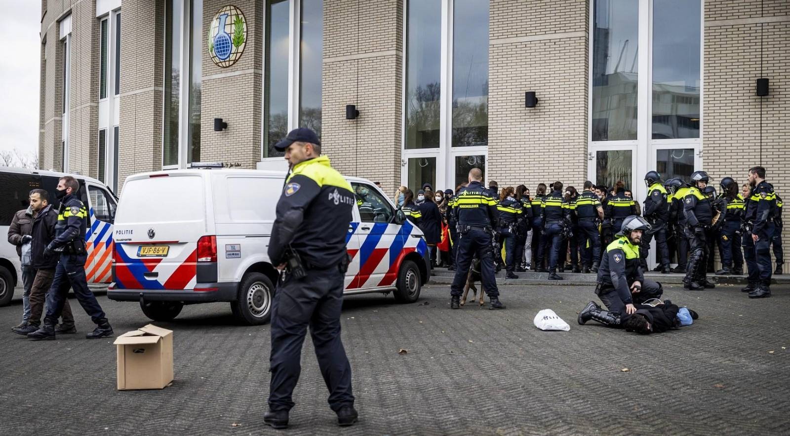 Dutch police arresting activists