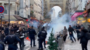 police in paris attack kurdish protestors